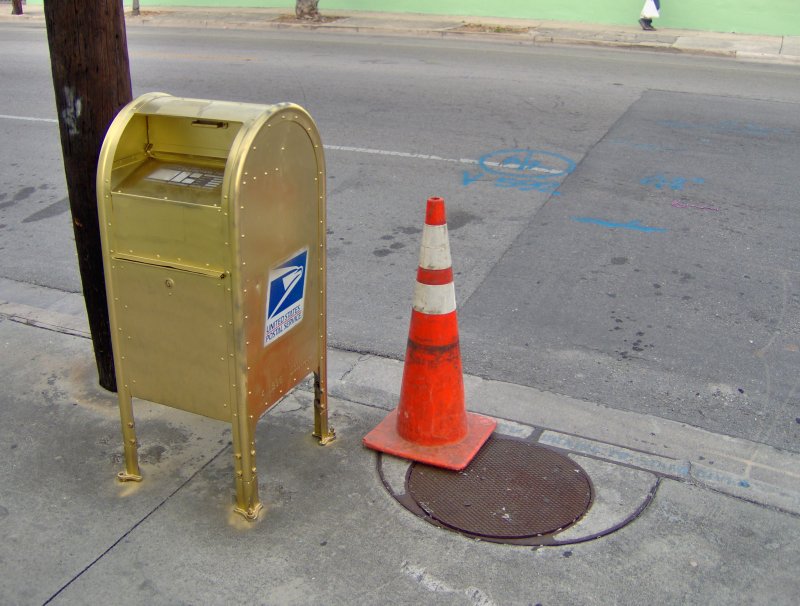 golden mailbox. NW 2 ave. & 26 St.
